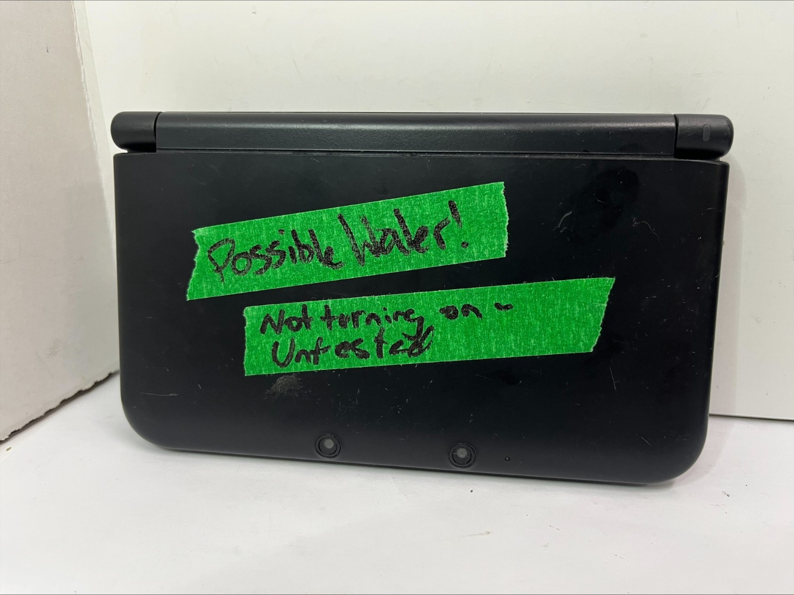 FOR PARTS! Nintendo 3DS XL – Black – Possible Water Damage! (B387)
