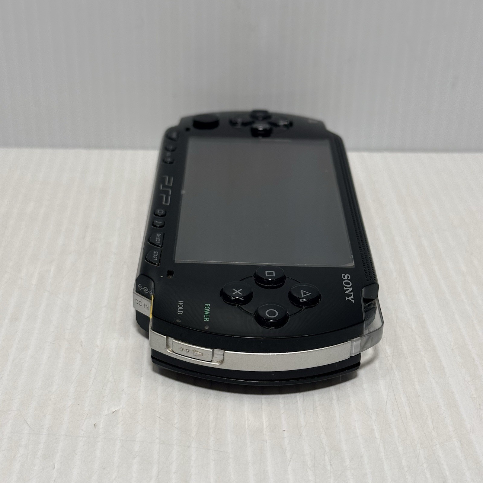 Sony PSP-1001 Black Console With Charger And 32 MB Sony Storage Memory Card