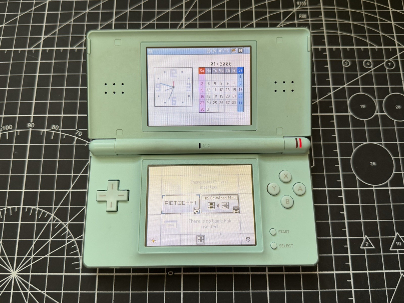 Nintendo DS Lite Used OEM Silver W/ R4 & 2GB SD – 100% Tested Region Free
