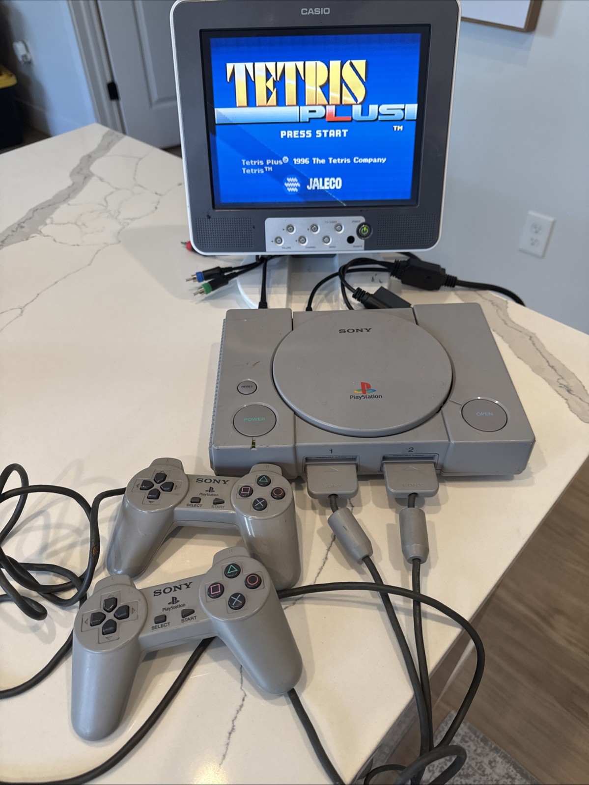 PlayStation 1 SCPH-7501 Console & Controllers. Works. Has Some Cosmetic Defects.