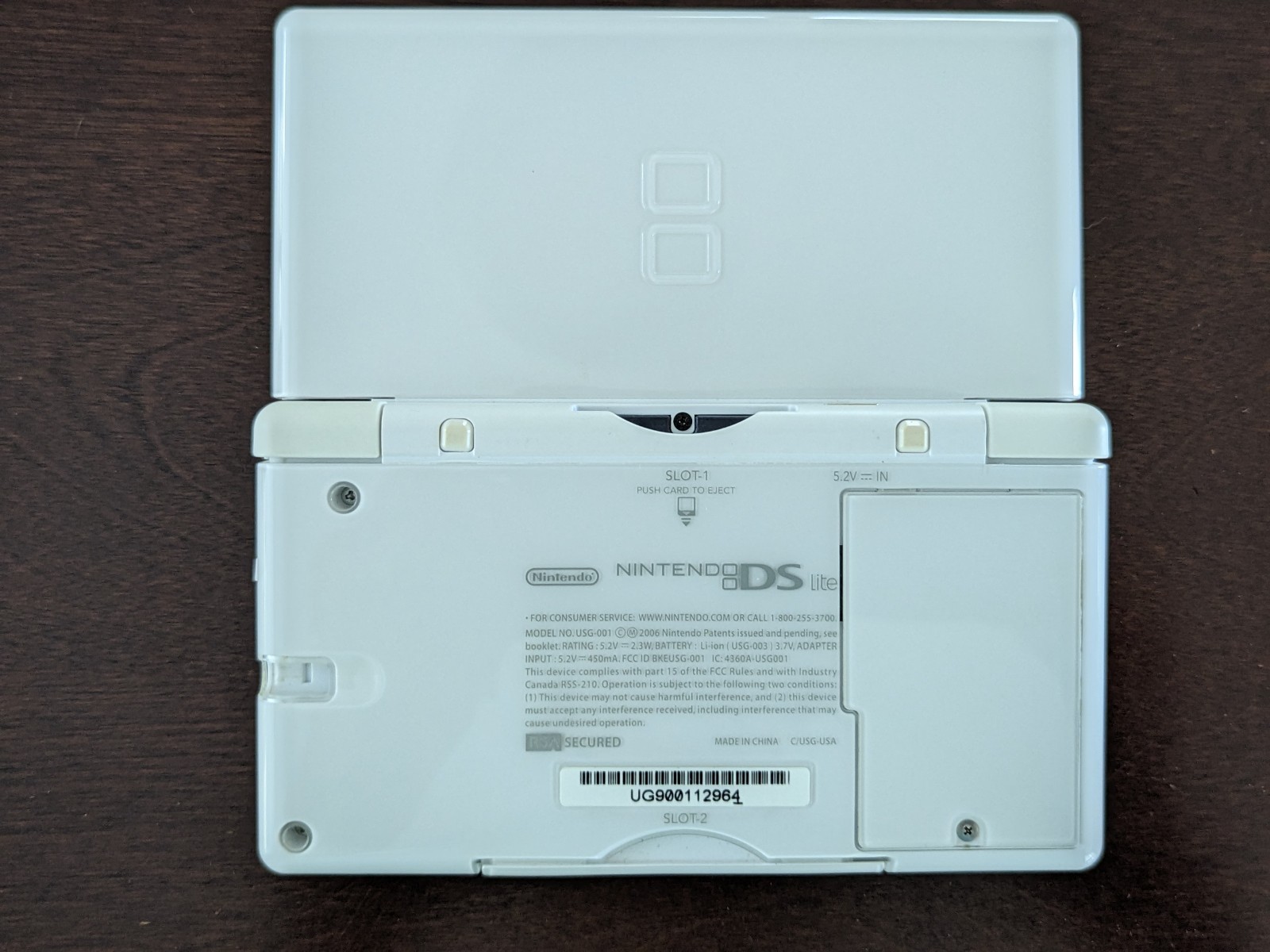 Nintendo DS Lite with Charger, Hard Case, soft case, 15 games in cases.