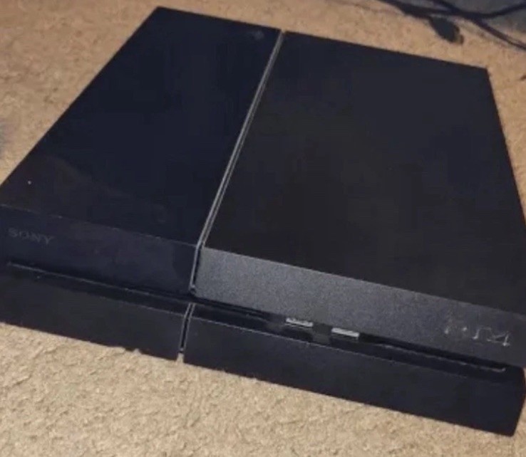 Sony PlayStation 4 Slim 1TB Console – Jet Black Read Description