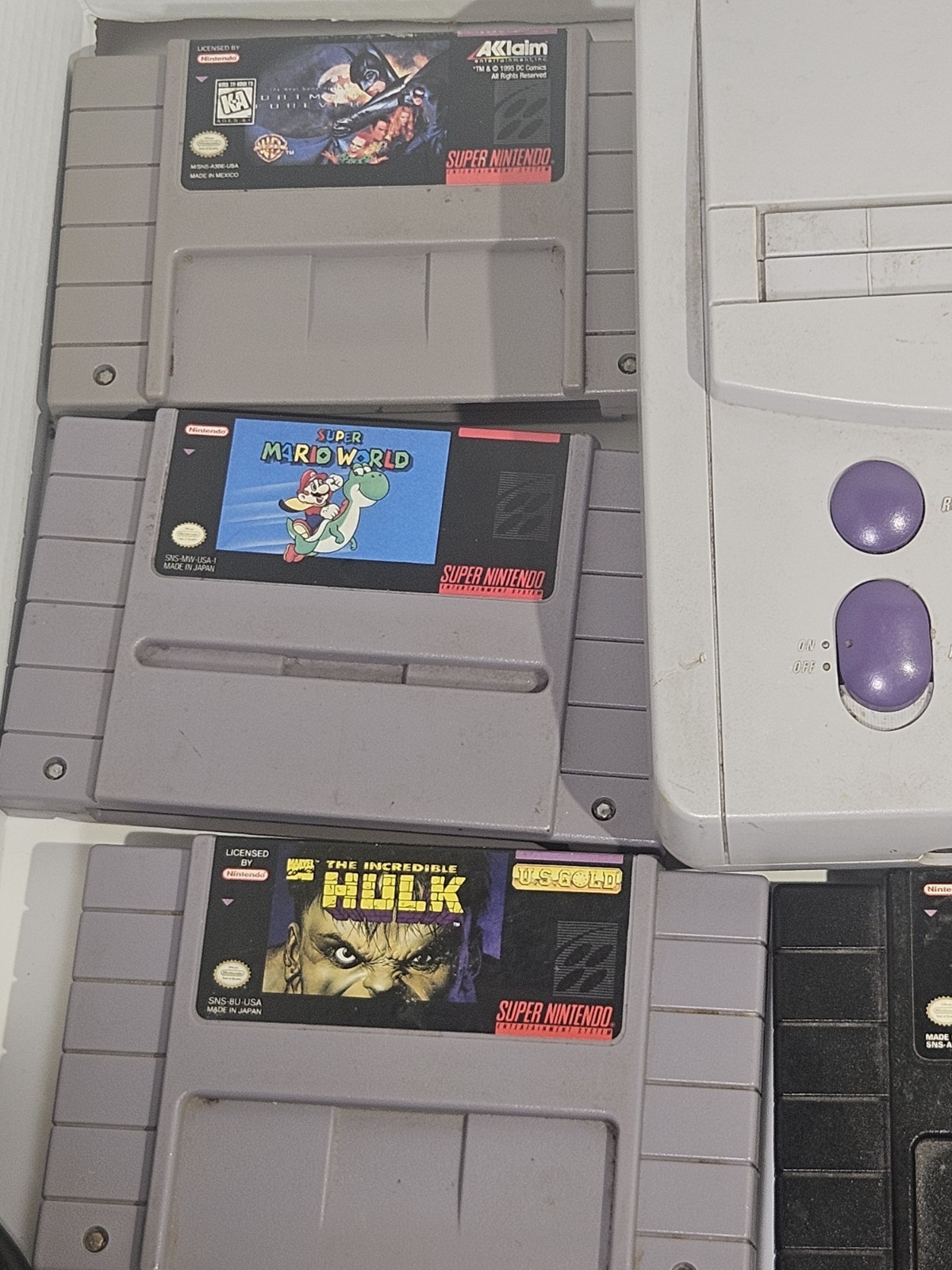 Super Nintendo SNES JR Console with 8 games, cords, and 1 controller