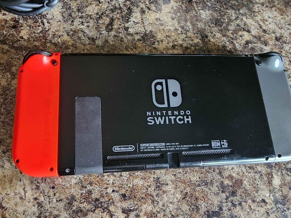 Used Nintendo Switch red and grey controller bundle