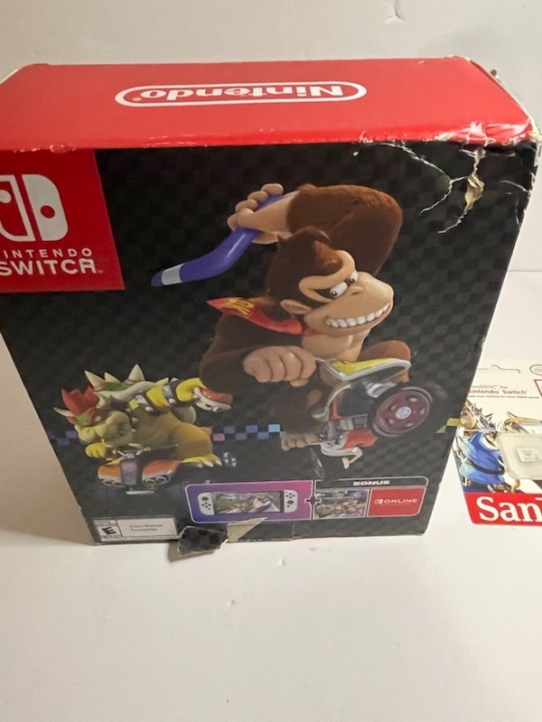 Nintendo Switch OLED – White Joycon With 64gb SD card (no game included)