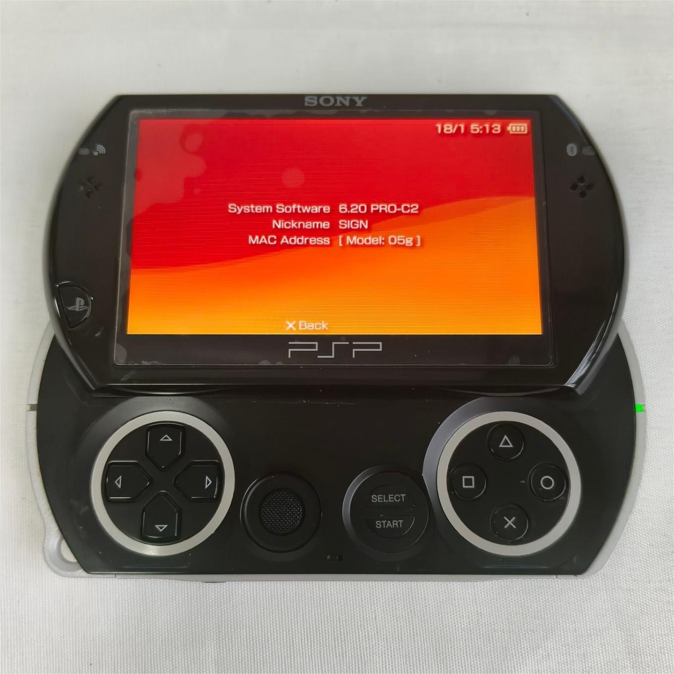 Sony PSP GO console Black with Charger PSP-N1003 Screen with protect