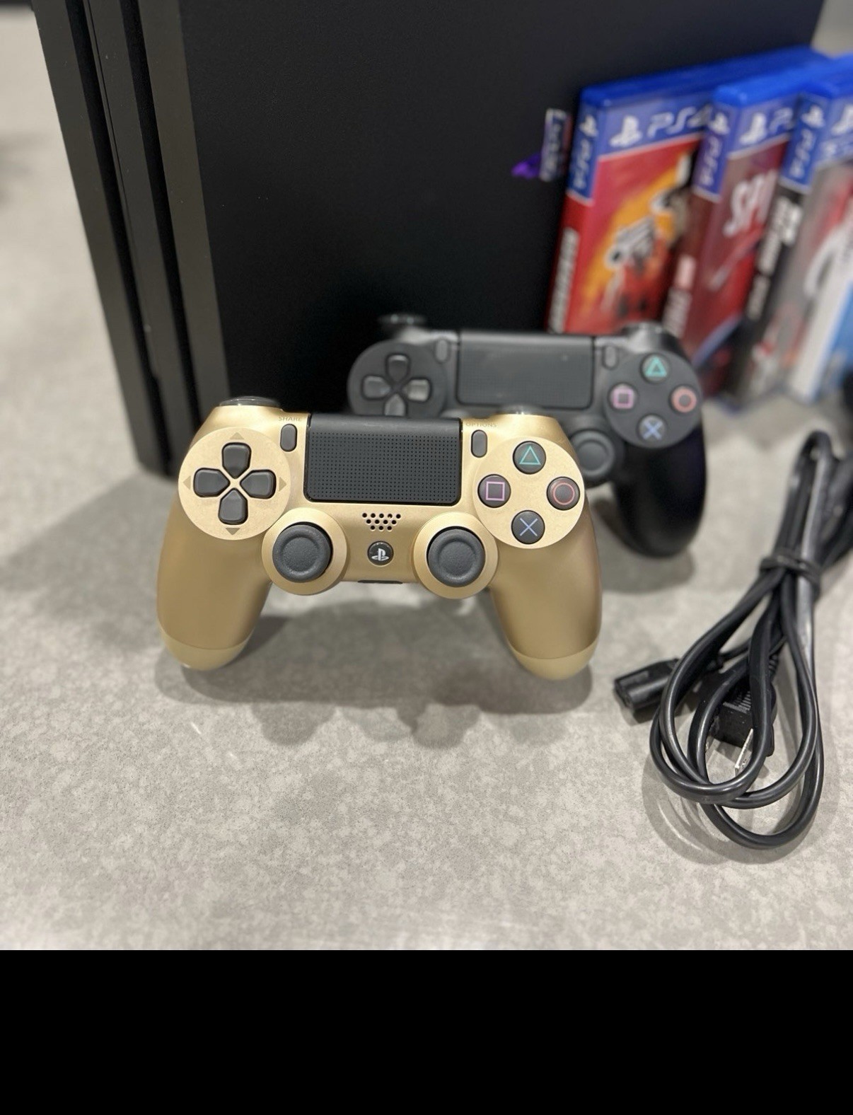 Sony PS4 1TB Console Bundle – 2 Controllers + 4 Games + Power Cord + Covers