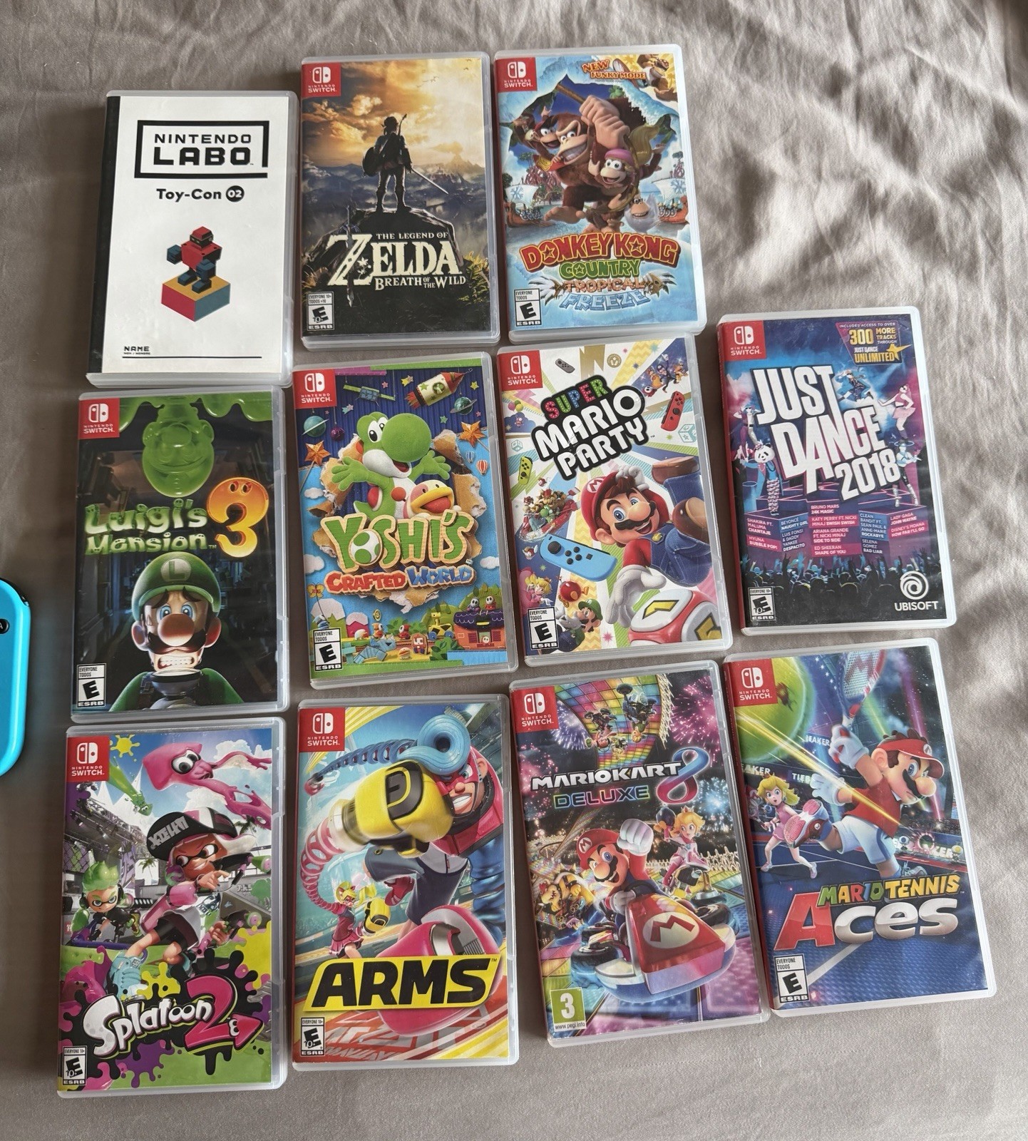Nintendo Switch w/ 13 games, controllers, amiibo & extras