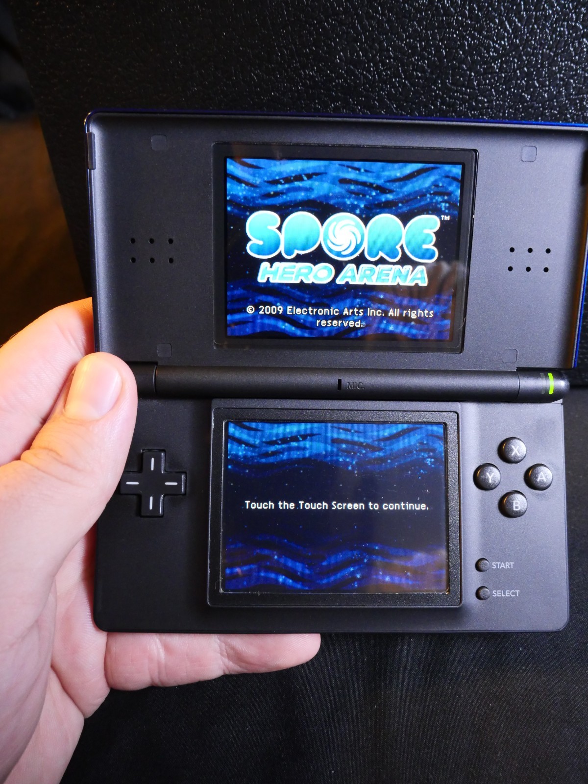 Nintendo DS Lite Blue/Black W/ Charger, Spore, Cars 2, Shrek Smash n’ Crash