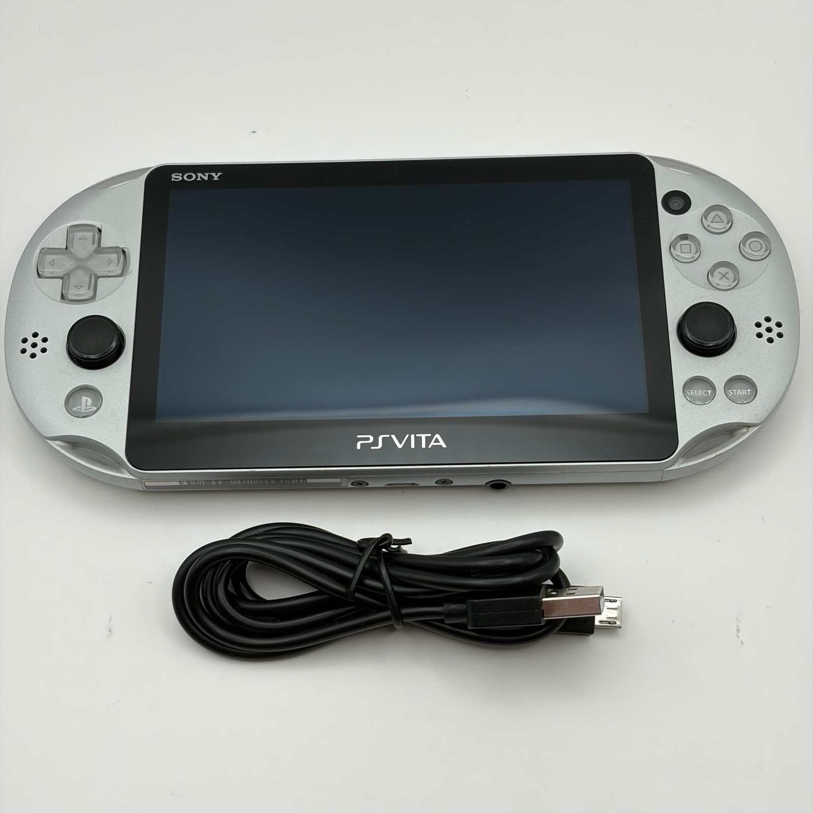 SONY PS Vita PCH-2000 Console Silver Very Good Fast Shipping No joystick drift.
