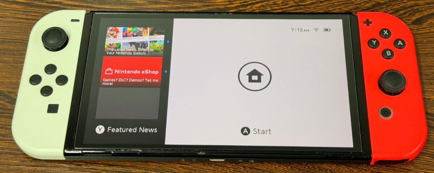 Nintendo Switch OLED Model 64GB Neon Red White Joycons – Good Used Condition