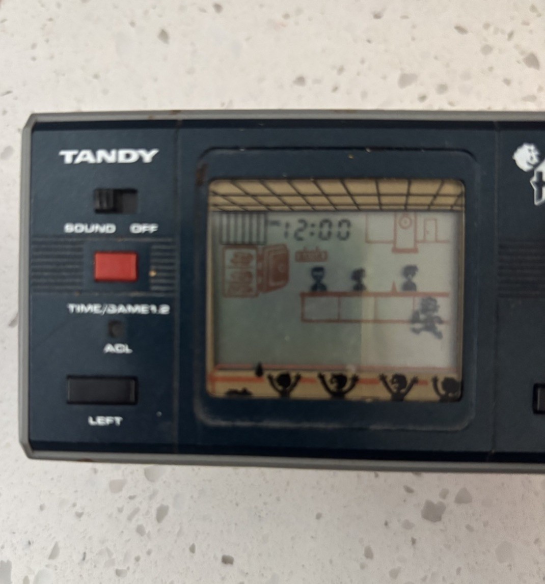 Vintage 1983 Tandy Hold Up LCD Game Handheld Electronic Game 60-2173 Works READ