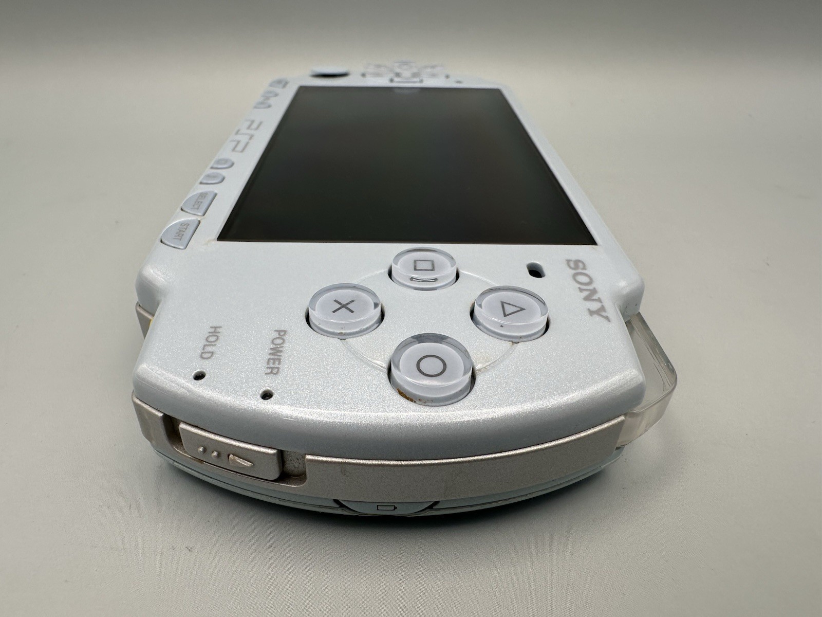 Sony PSP 2000 Console – Felicia Blue + New Battery + 2GB Memory Stick + Charger