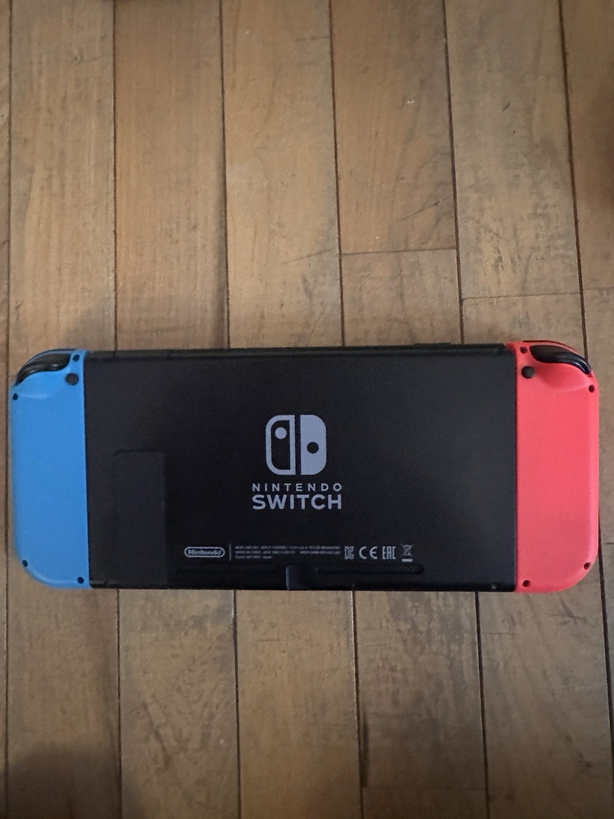 Nintendo Switch 32GB Handheld Console – Neon Red/Neon Blue with accessories