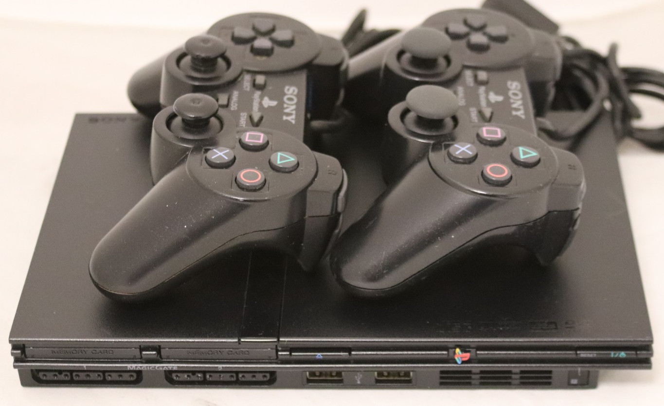 Sony PlayStation 2 Slim (SCPH-75001) W/ two controllers