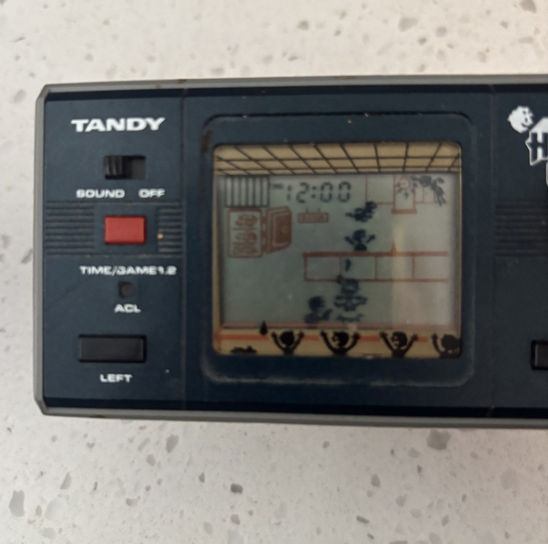Vintage 1983 Tandy Hold Up LCD Game Handheld Electronic Game 60-2173 Works READ
