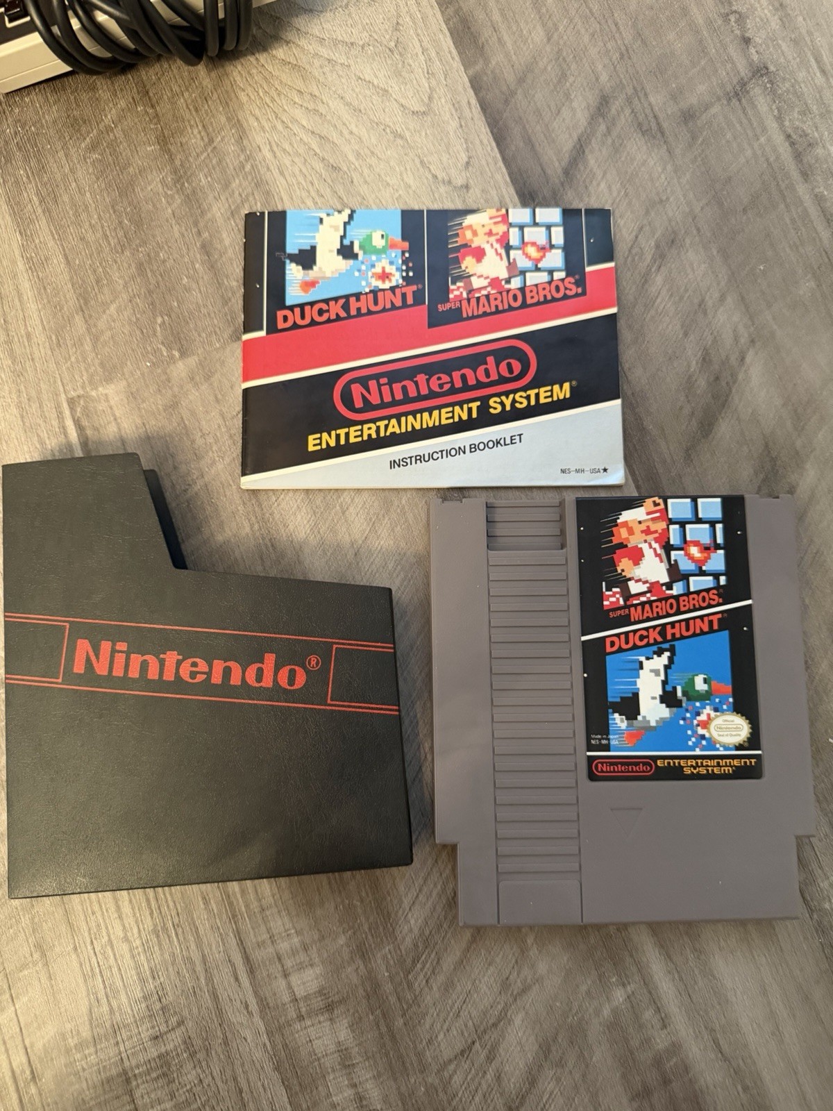 PRISTINE NES Console + 11 Games + Zapper + 2 oem Controllers + 3 Manuals!