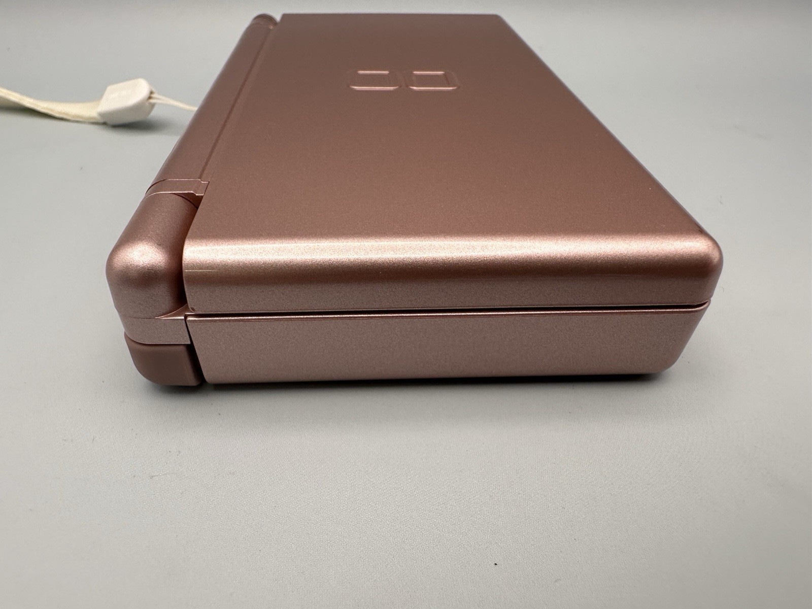 Nintendo DS Lite USG-001 Metallic Rose – original slot cover, stylus, wriststrap