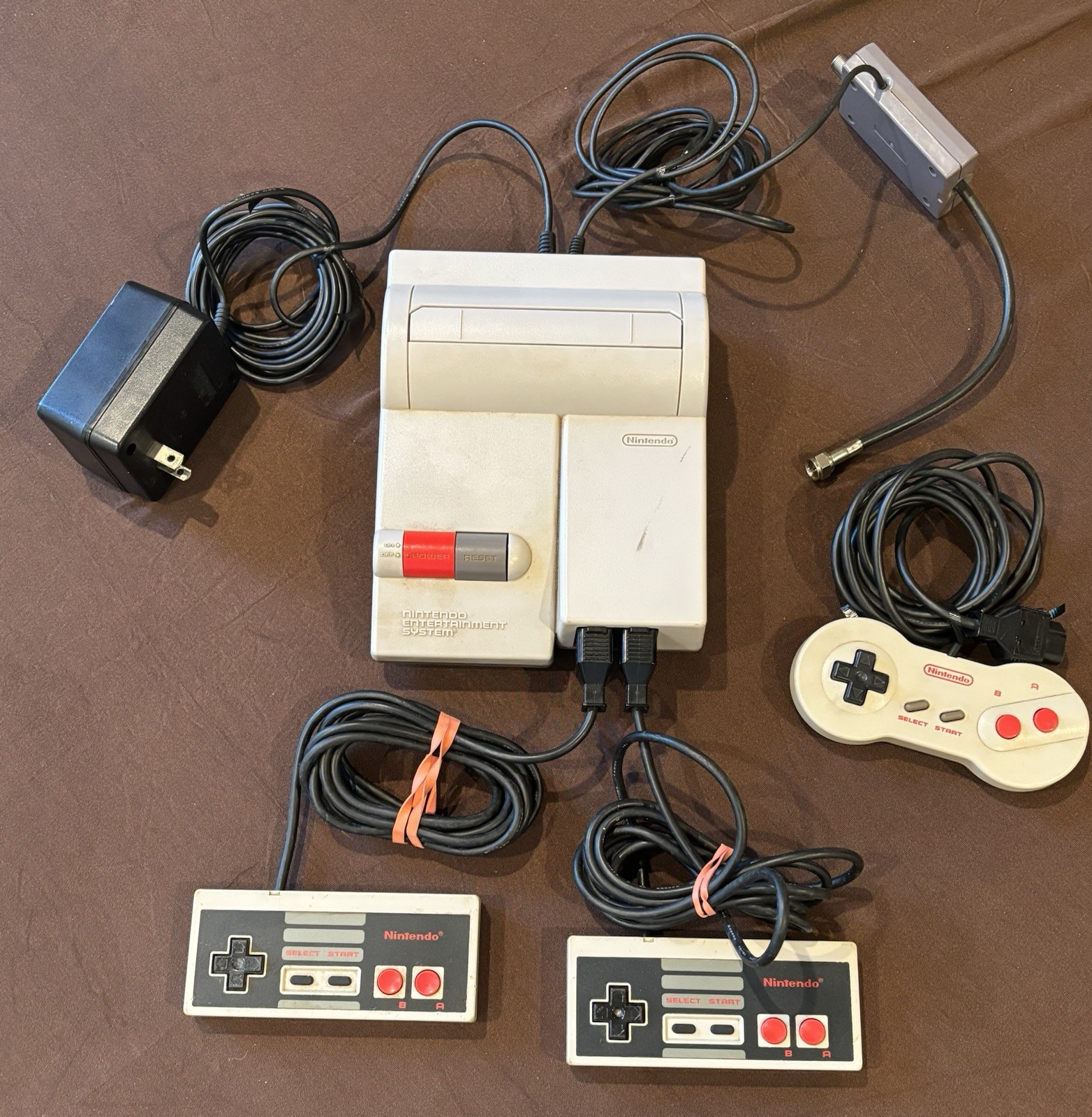 nintendo nes-101 top loader console + Dog bone, Two Controllers & Adapter Switch