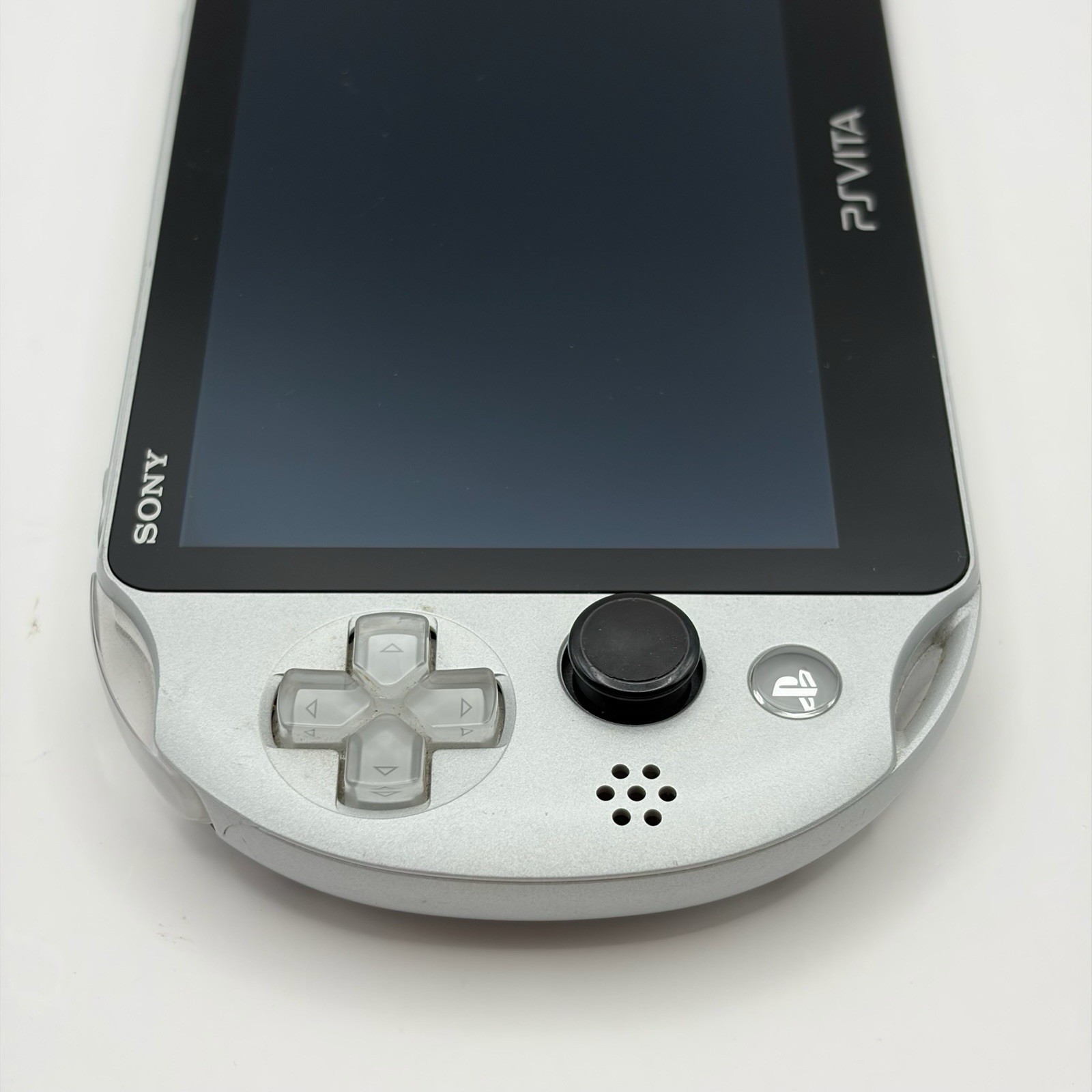 SONY PS Vita PCH-2000 Console Silver Very Good Fast Shipping No joystick drift.