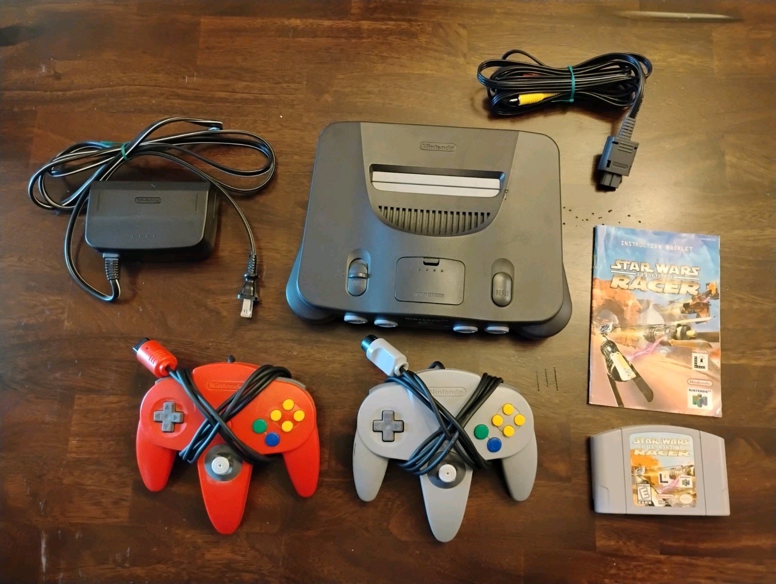 NINTENDO N64 CONSOLE NUS-001 WITH 2 CONTROLLERS, CABLES, & 1 GAME- TESTED