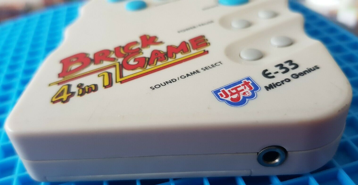 Micro Genius Brick Game 4 In 1 Model E-33 Video Game Console Used