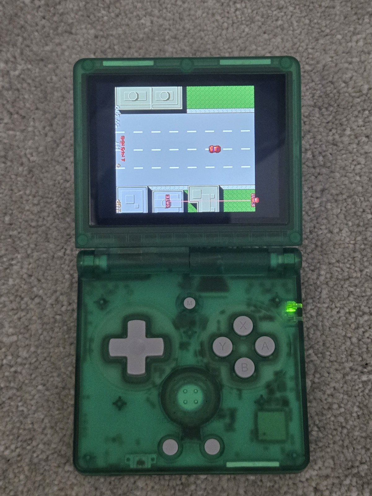 Anbernic game console RG35XXSP retro handheld transparent green tested arcade