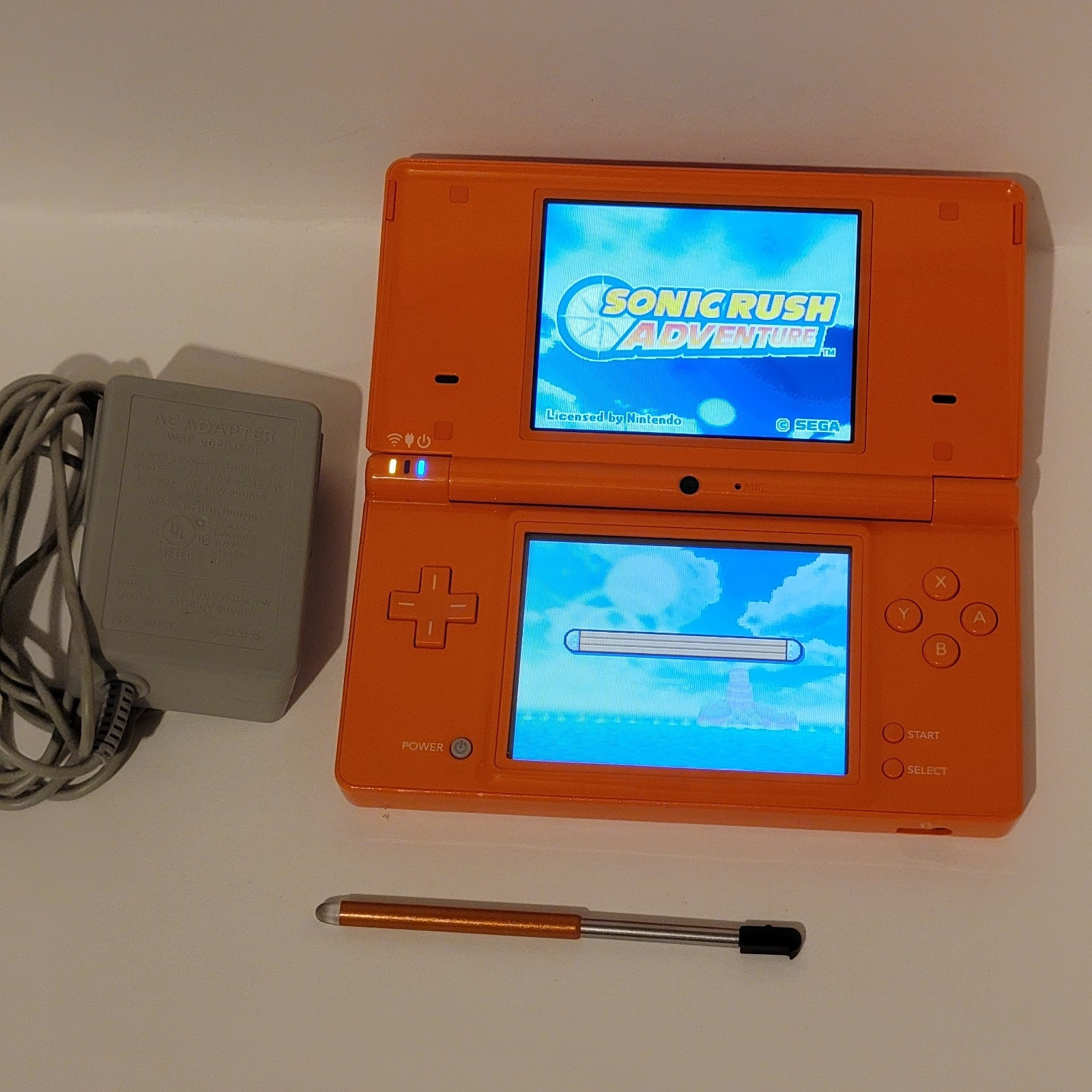 Nintendo DSi Orange Console W/ Sonic Rush Adventure, Stylus, & Charger – READ