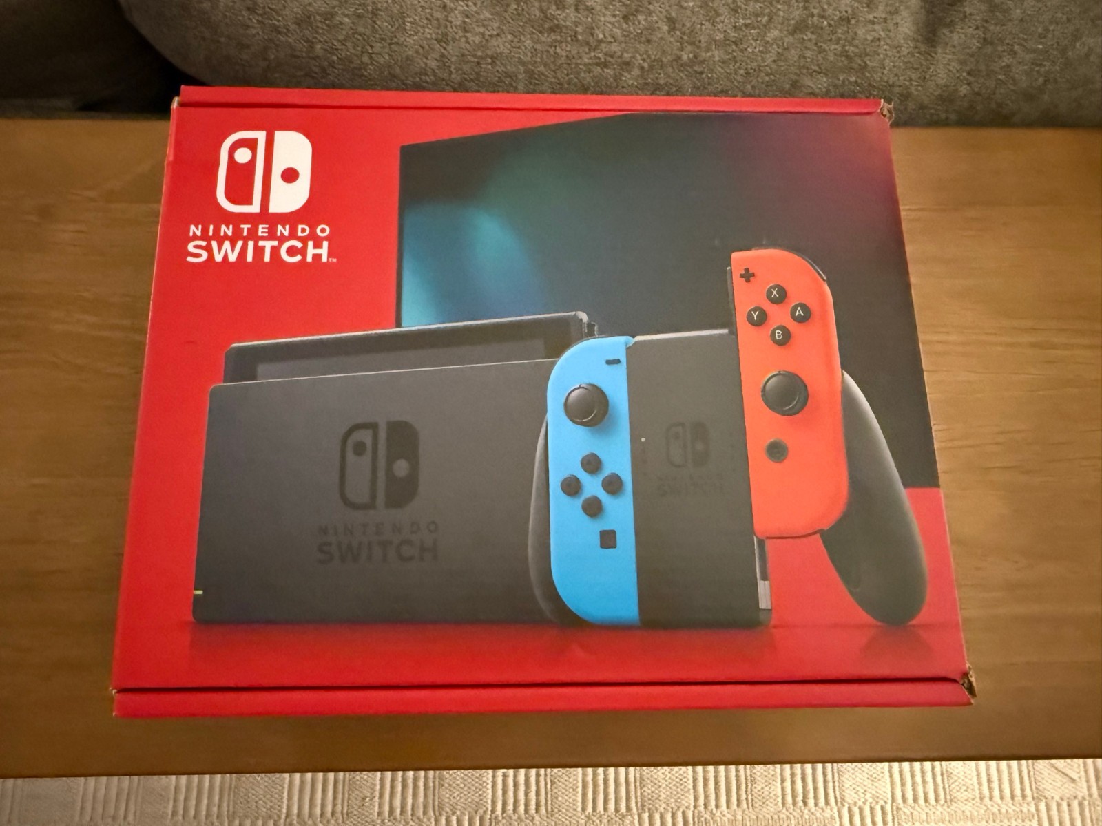 Brand New Nintendo Switch Handheld Console – Neon Red/Neon Blue