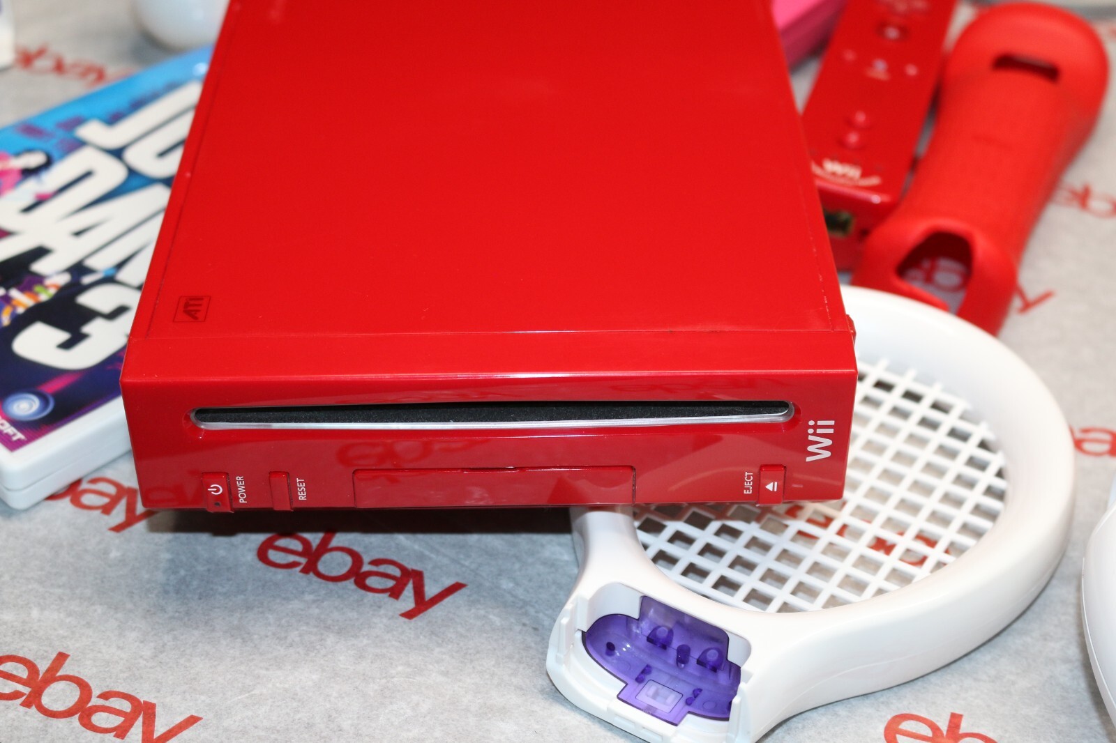 Limited edition NINTENDO WII red color w/ a lot of accessories and game NICE