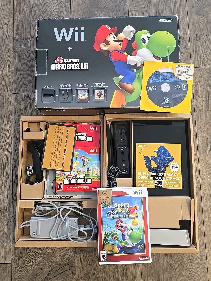 Nintendo Wii Black Console bundle CIB featuring New Super Mario Bros Galaxy 2