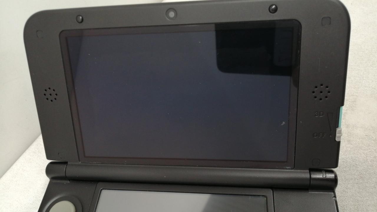 Nintendo SPR-001/Turquoise X Black Nintendo 3DSLL