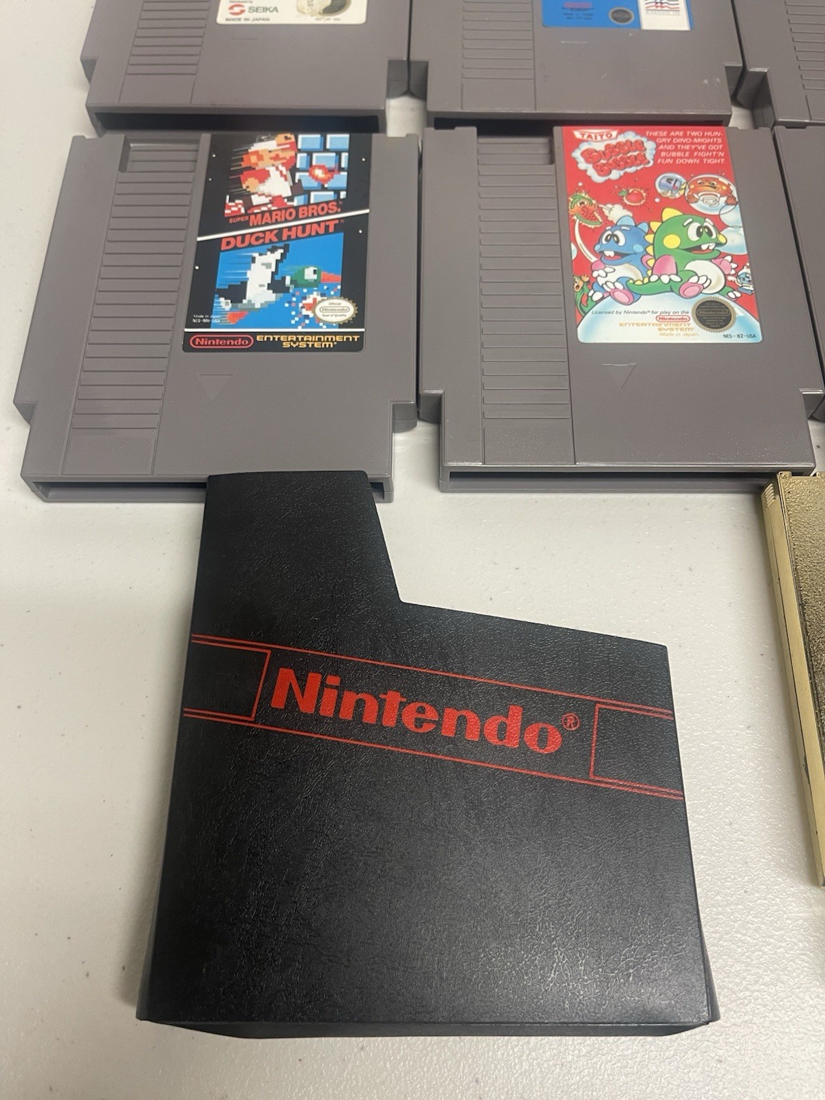 Original Nintendo NES bundle with cords, 2 controllers, zapper, and 17 games