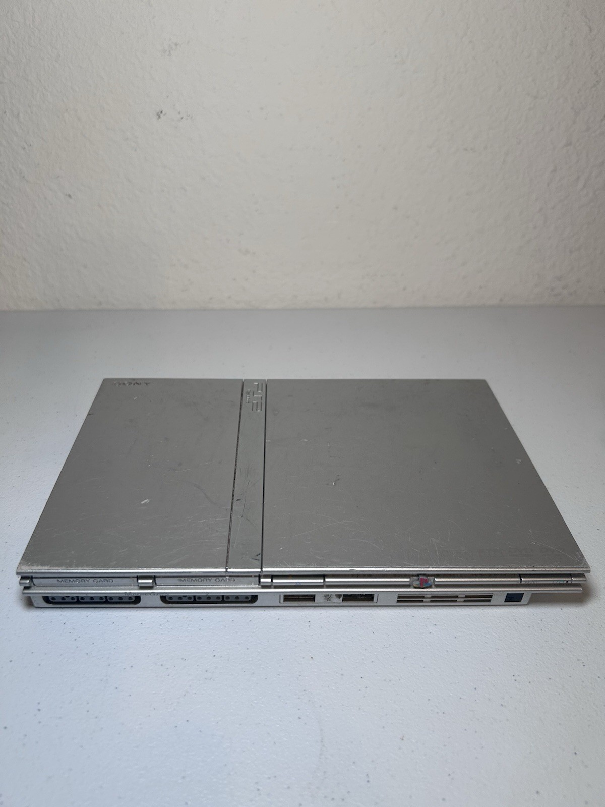 Sony PlayStation 2 Slim Silver (SCPH-79001) Bundle With Controller And Cords