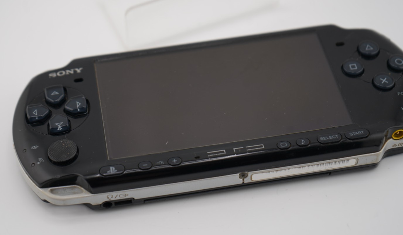 Sony PSP-3000 Console with OEM Battery, Game, 64GB SD, Case Bundle – Piano Black