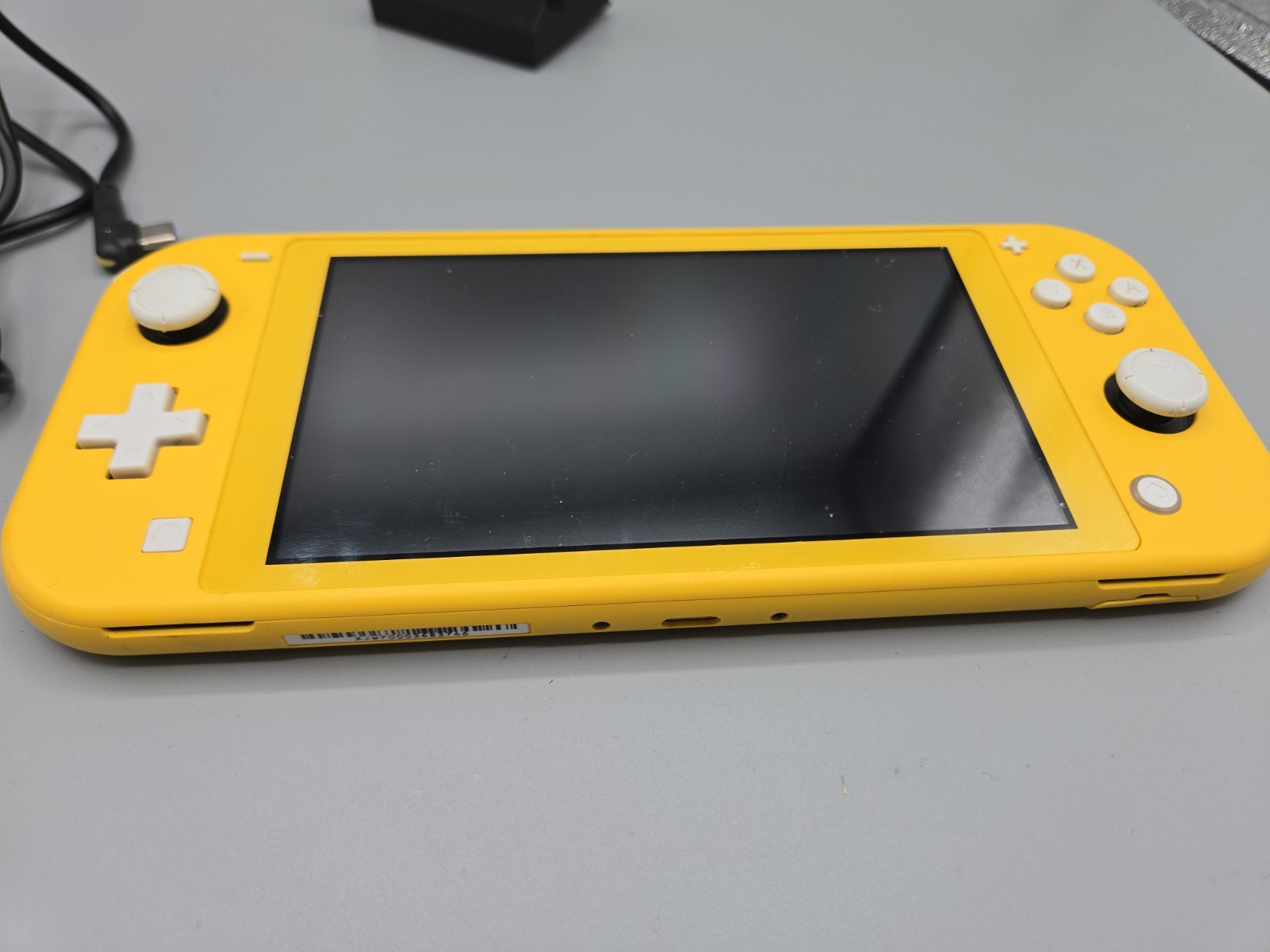 Nintendo Switch Lite 32GB Handheld Console Yellow W/ Zelda Breath Of Wild Game