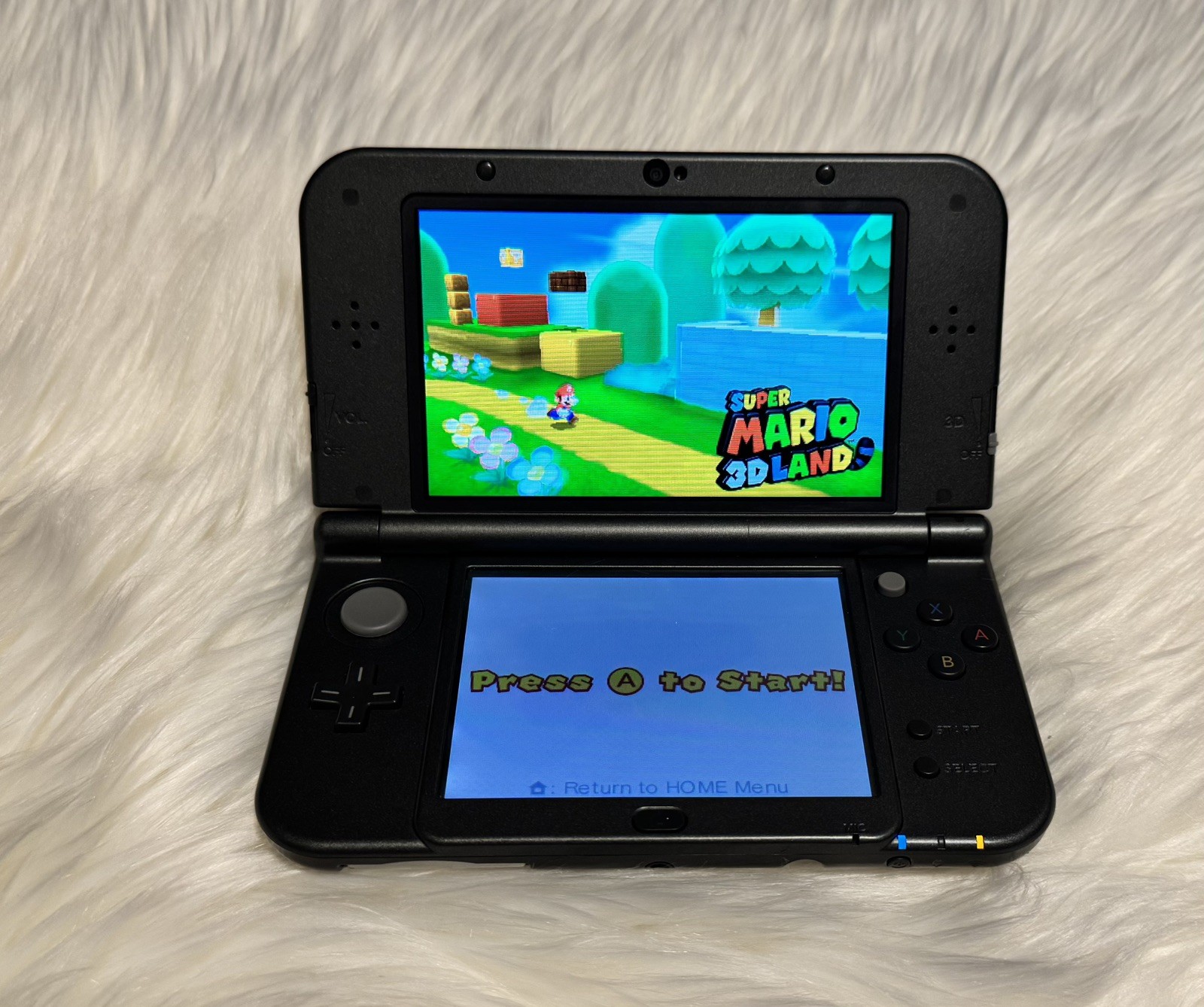 New Nintendo 3DS XL Metallic Black – Includes Charger, 2 Games and Carrying Case