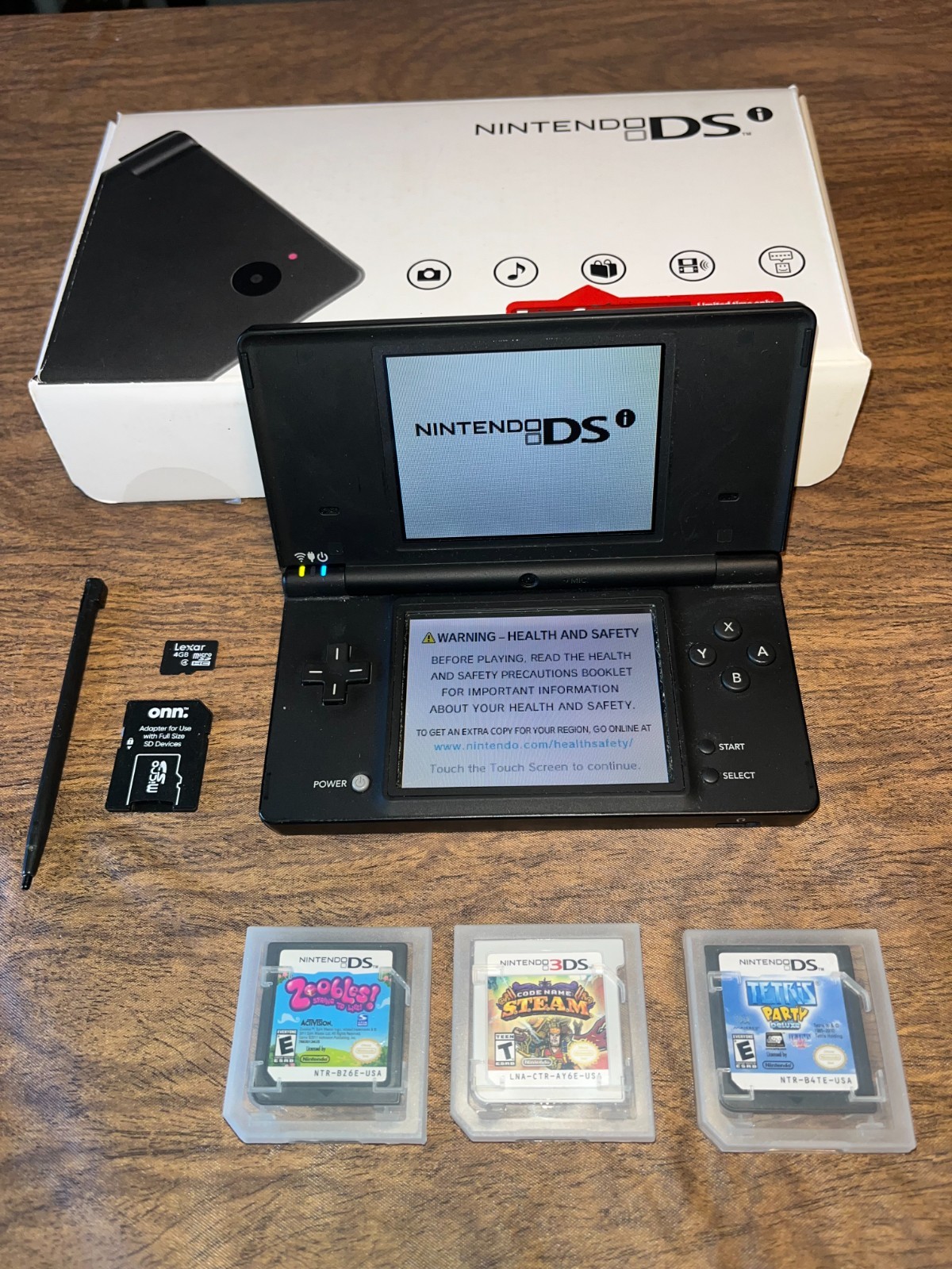 Nintendo DSi Console in Black with Games in Box (no charger) WORKS !! FREE SHIP