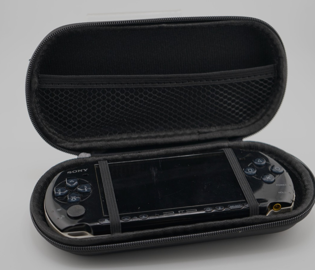 Sony PSP-3000 Console with OEM Battery, Game, 64GB SD, Case Bundle – Piano Black