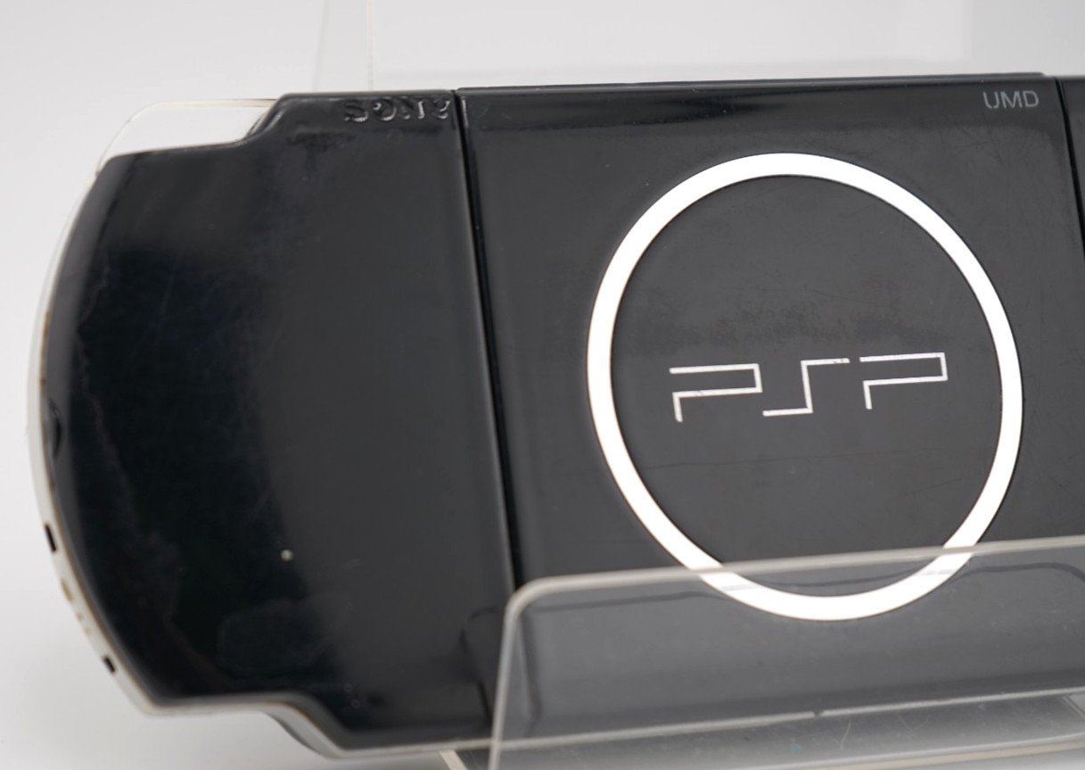 Sony PSP-3000 Console with OEM Battery, Game, 64GB SD, Case Bundle – Piano Black