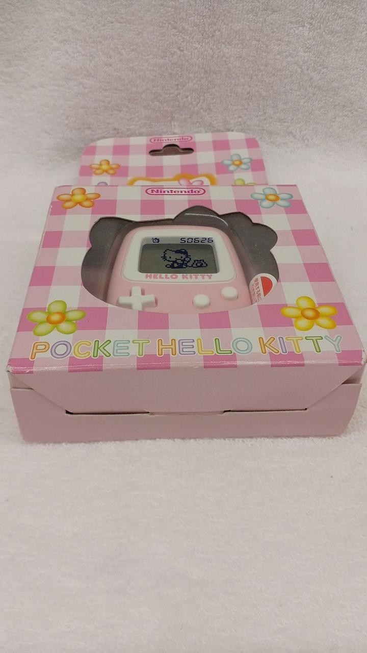 Nintendo Pocket Hello Kitty MPG-001 Unused Virtual Pet Game A2682