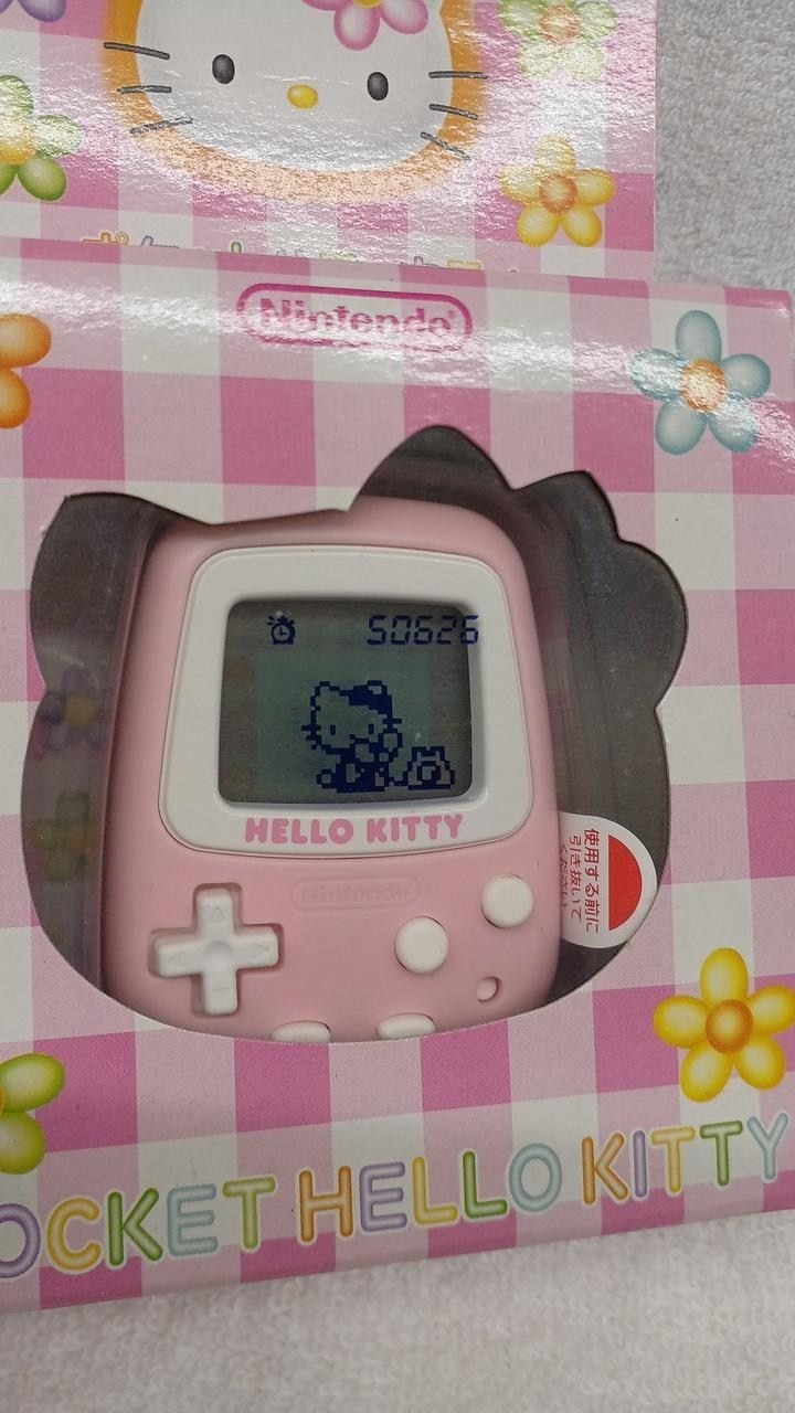 Nintendo Pocket Hello Kitty MPG-001 Unused Virtual Pet Game A2682