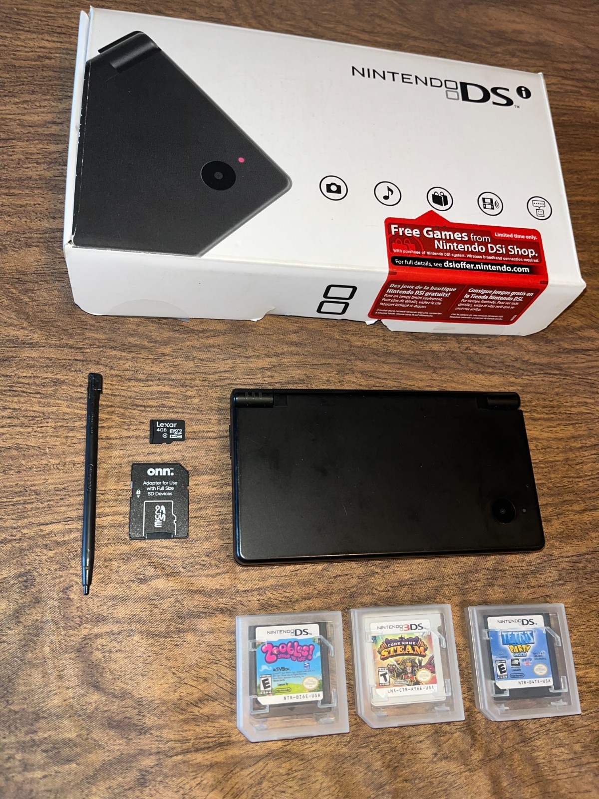 Nintendo DSi Console in Black with Games in Box (no charger) WORKS !! FREE SHIP