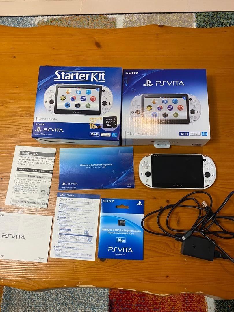Near Mint SONY PS Vita PCH-2000 Console Glacier White Tested Starter Kit CIB