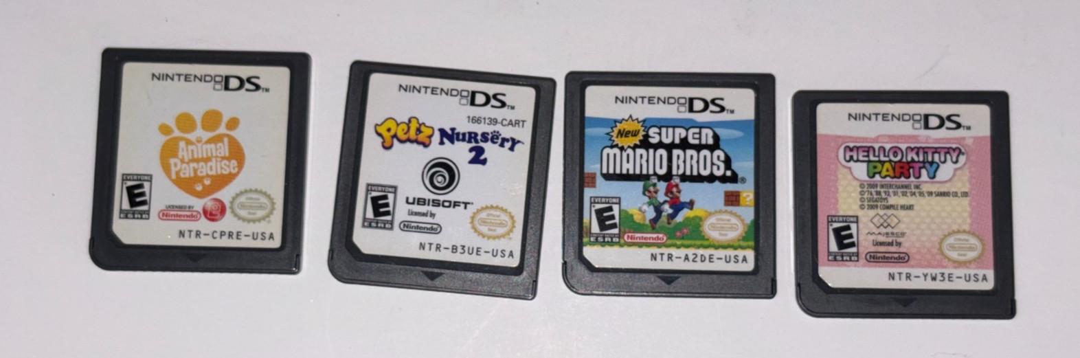 Nintendo DS Lite Red with Case, Stylus, Charger, Case, Protectors & 5 Games
