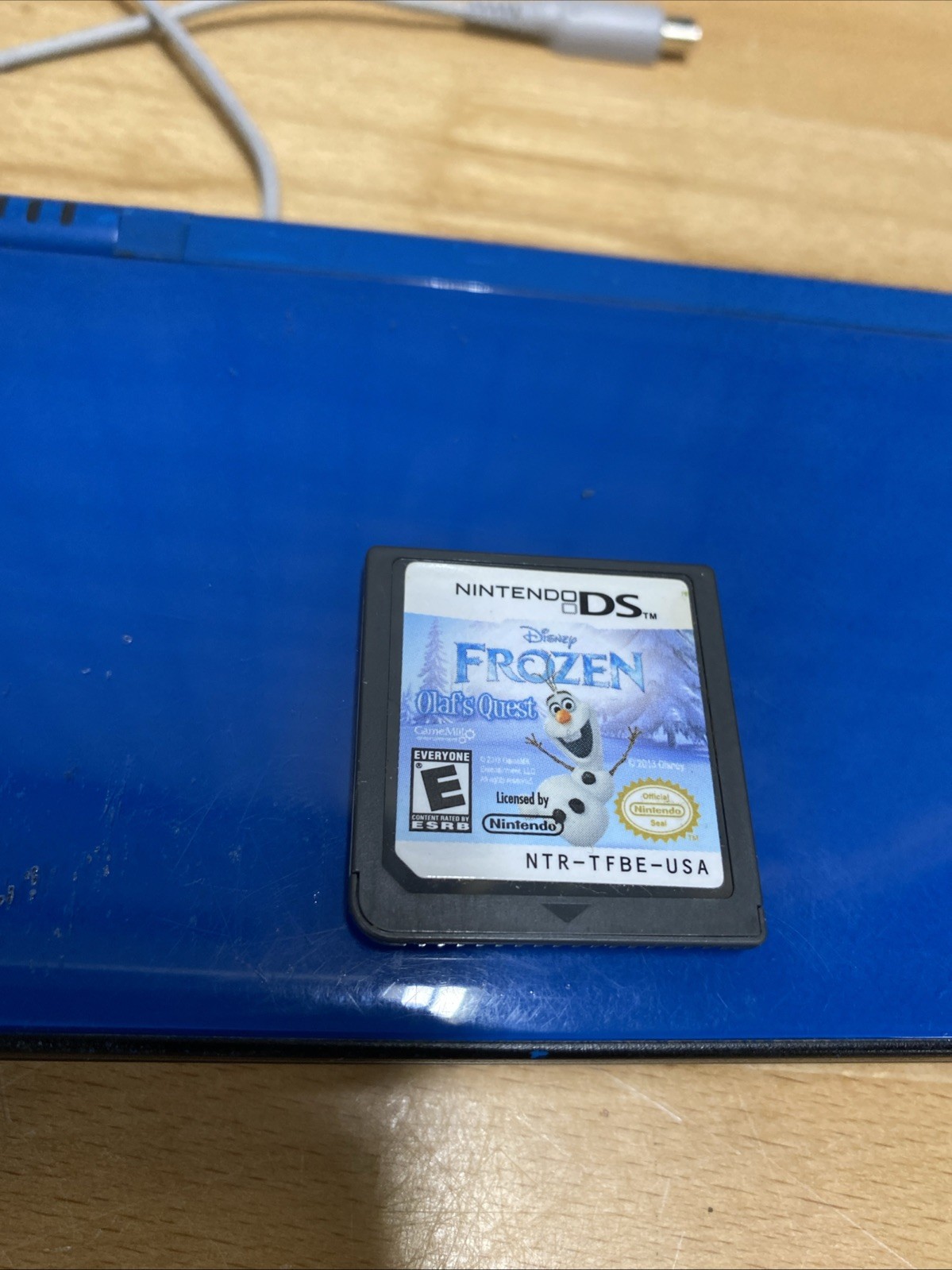 Nintendo DSi XL Handheld System – Midnight Blue With Charger And Frozen Game