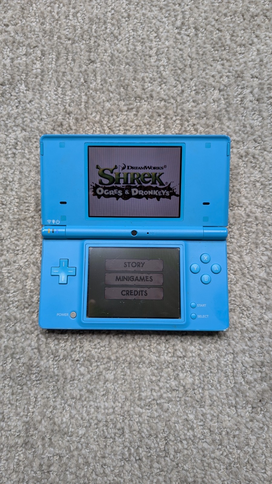 Nintendo DSi Light Blue Handheld Console Game System w/ Charger & 2 Games