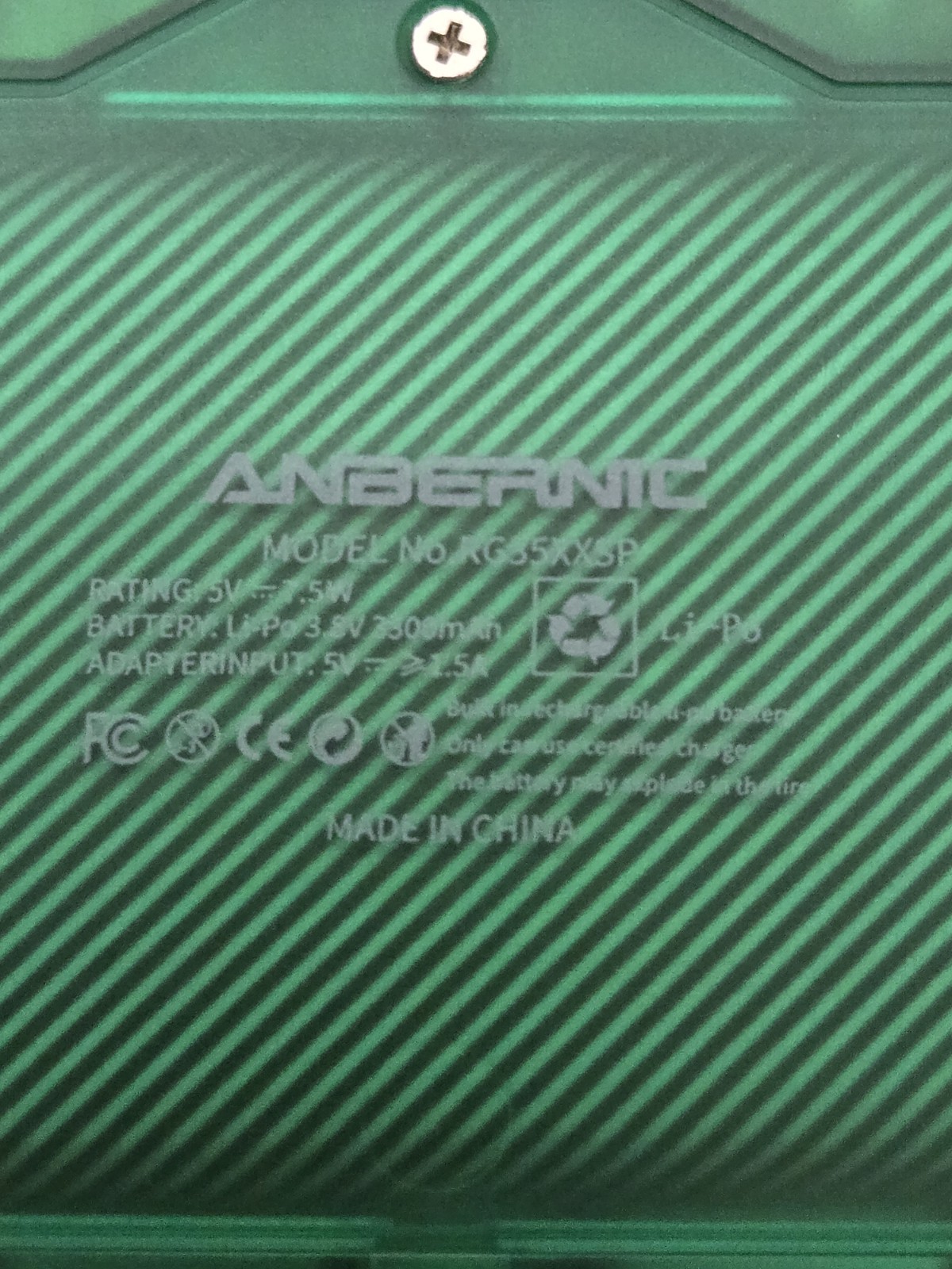 Anbernic game console RG35XXSP retro handheld transparent green tested arcade