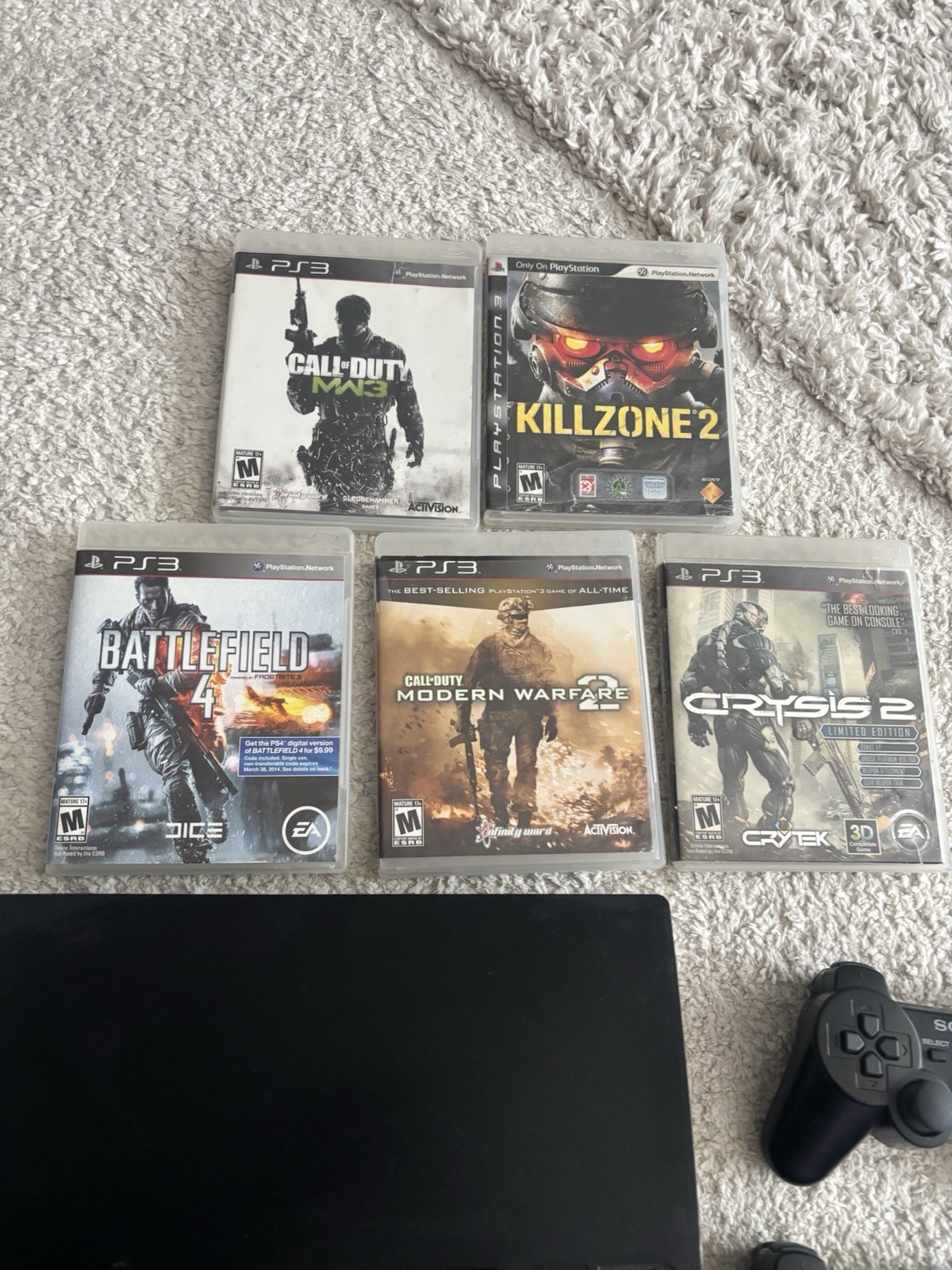 PlayStation 3 (PS3) Slim 120GB – 2 Original Sony Controllers + 5 Games