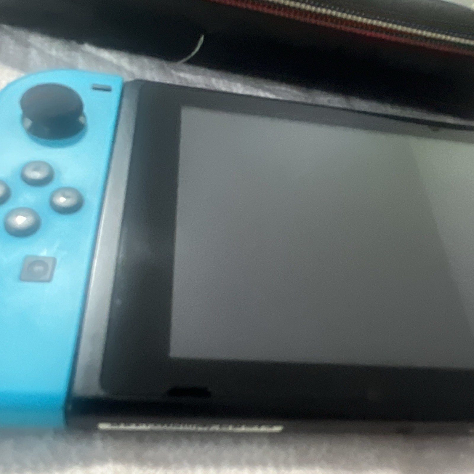 Nintendo Switch with Neon Blue and Neon Red Joy-Con (HAC-001-01) W/ Case